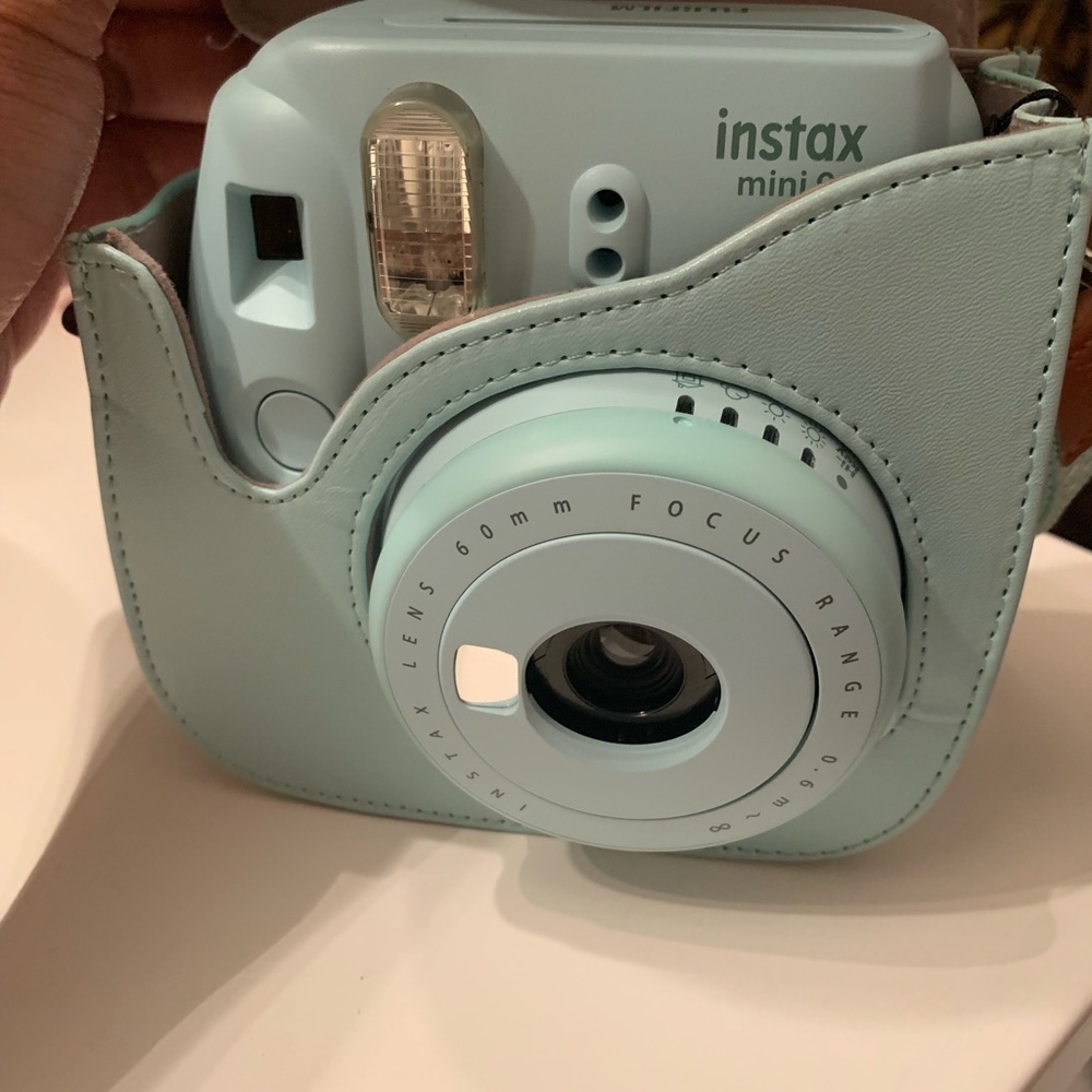 Mint Green Instax Mini 9 camera